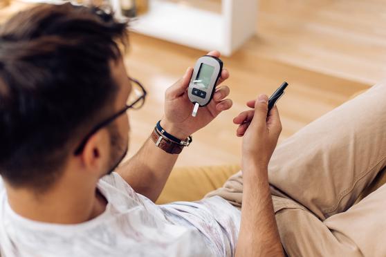 Man reading monitor